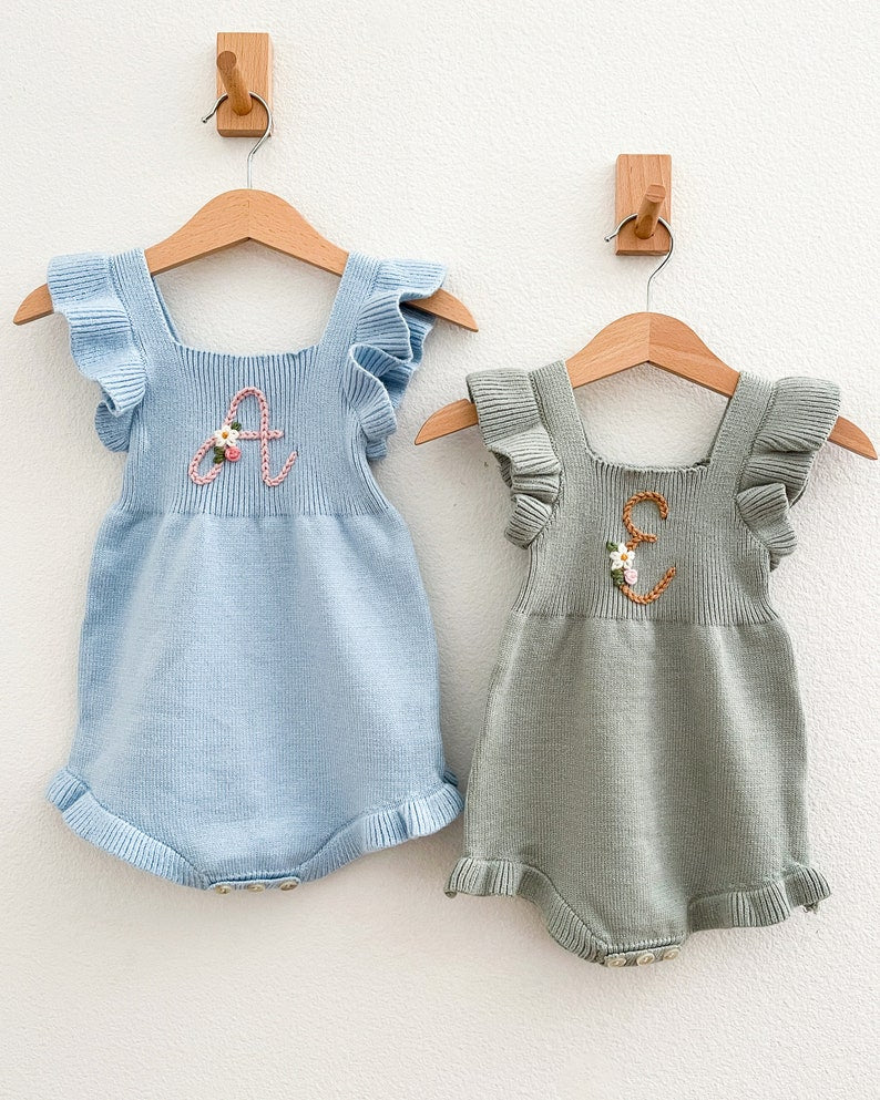 initial monogrammed hand embroidered knit sweater romper for babies toddlers with ruffle trim and optional flower embroidery