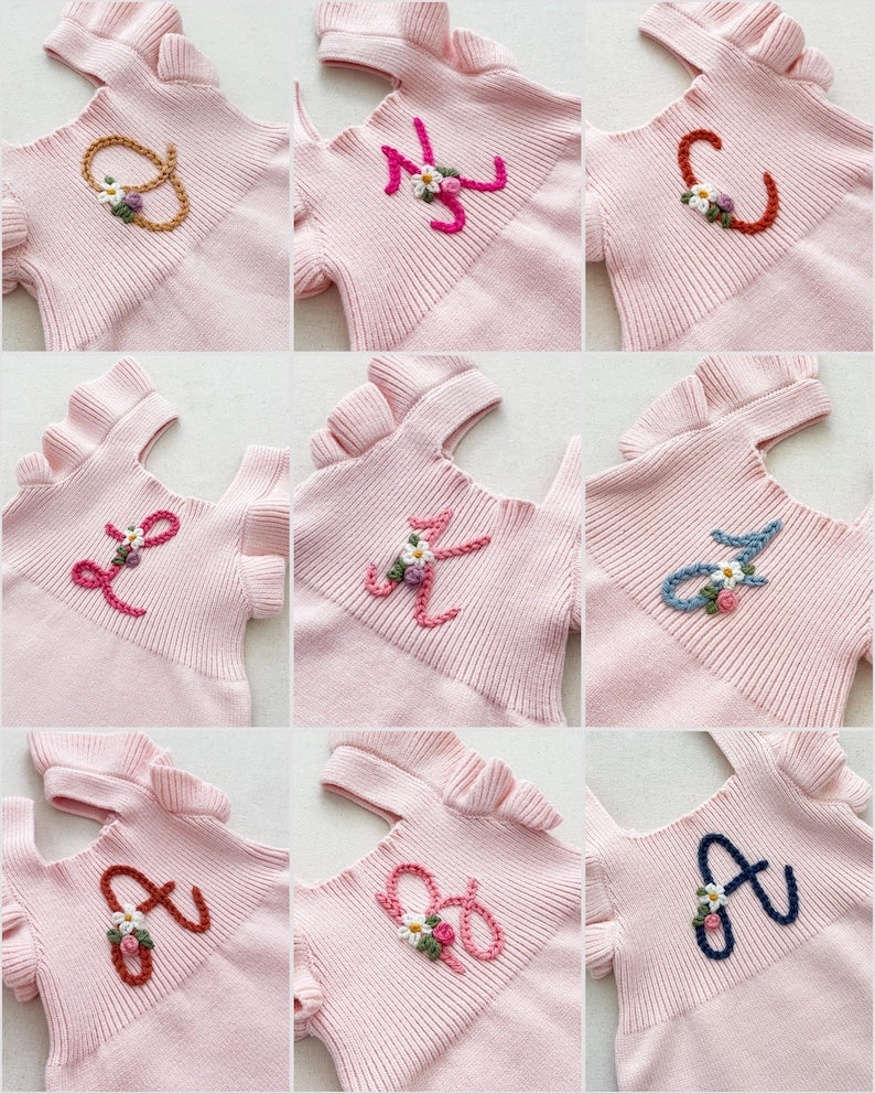 initial monogrammed hand embroidered knit sweater romper for babies toddlers with ruffle trim and optional flower embroidery