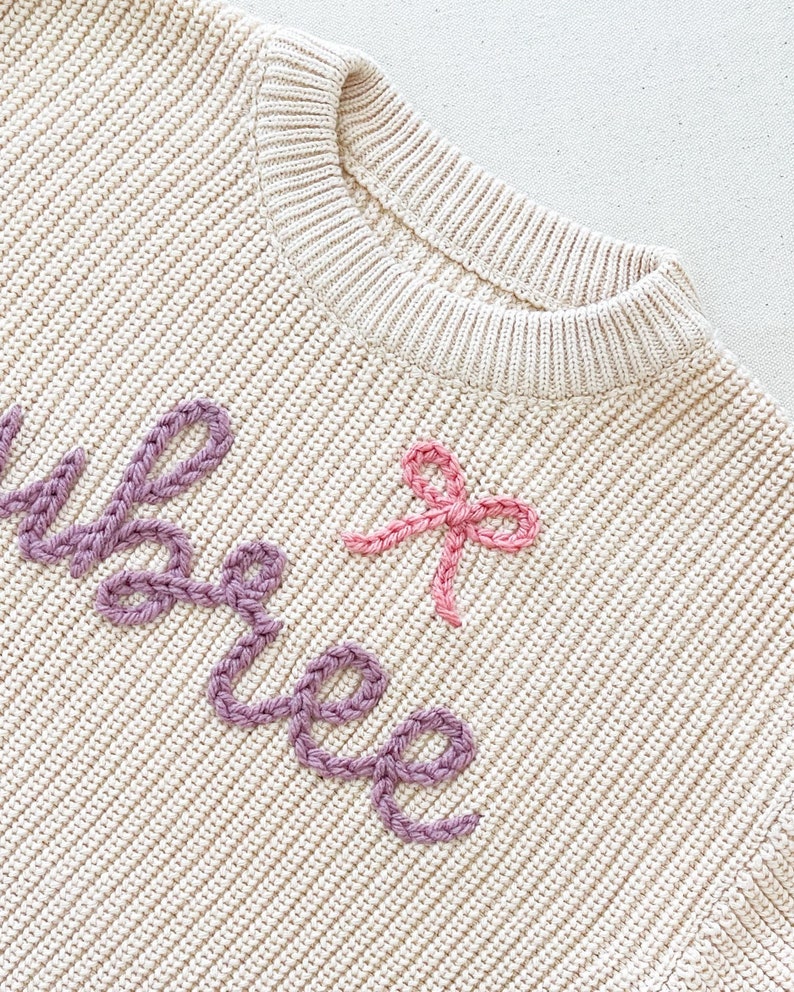 ADD A BOW to an embroidered sweater or romper (not a listing for a sweater or romper)